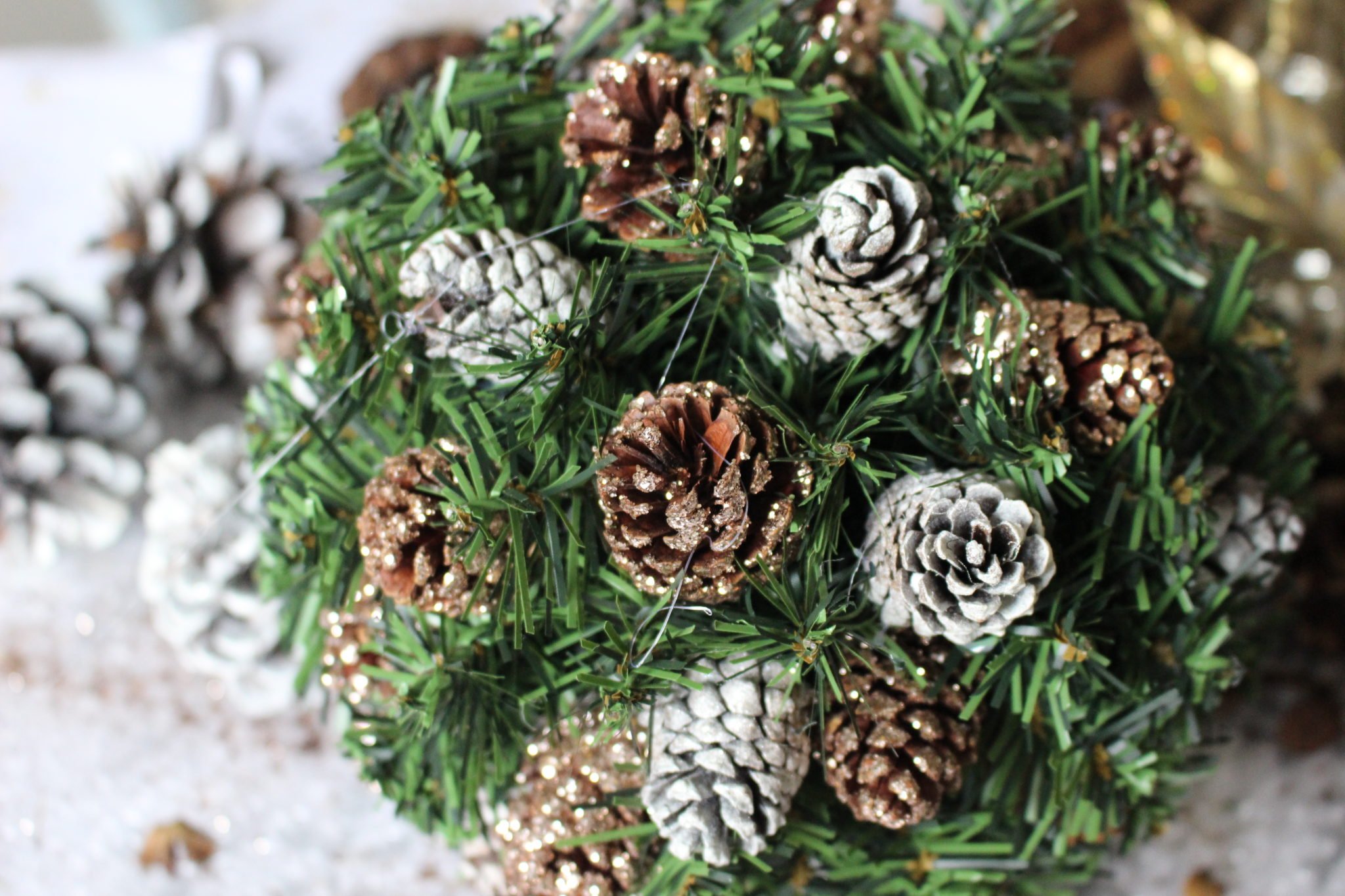 How To Make A Christmas Kissing Ball With Pinecones Our Crafty Mom