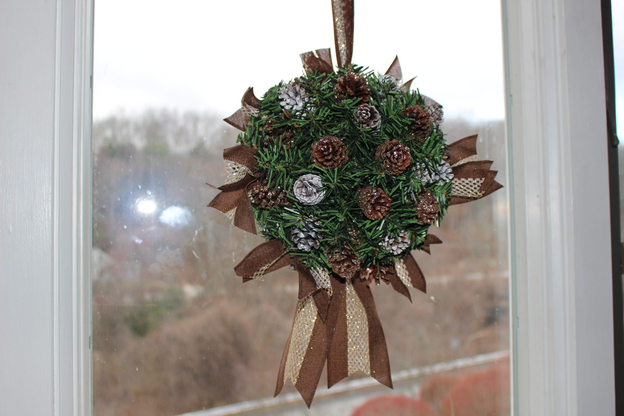 How To Make A Christmas Kissing Ball With Pinecones Our Crafty Mom