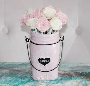 felt roses made with cricut in a pin mason jar