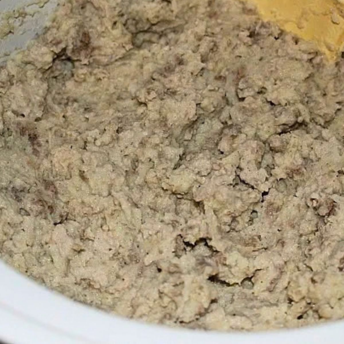 bowl of French meat stuffing in white bowl