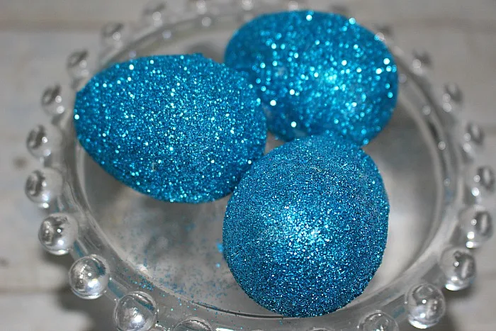How To Make Gorgeous Glitter Easter Eggs Our Crafty Mom #eastereggs #glittereastereggs #dollarstorecrafts #glittereggs #crafts #craftdestashchallenge