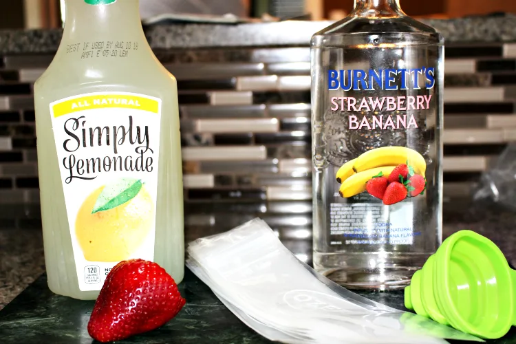 How To Make Strawberry Banana Vodka Freeze Pops **21+** Our Crafty Mom #pinterestchallenge #ourcraftymom #recipes #adultfreezepops #summerrecipes #boozepops
