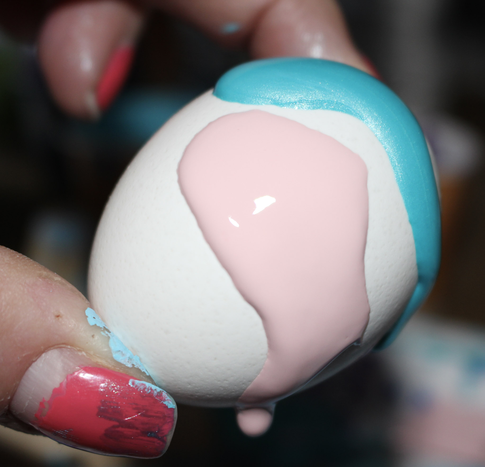 pink and blue paint on egg