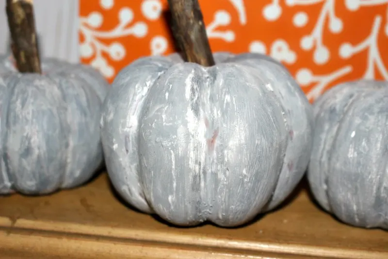 faux concrete dollar store pumpkins close up