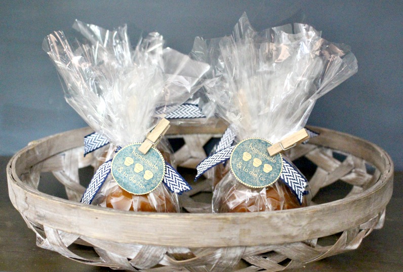 caramel apples in basket from decocrated home decor as party favors with gift tag