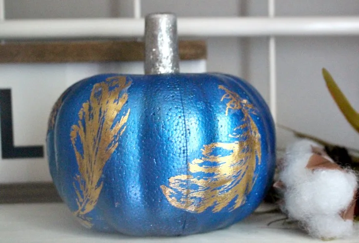dollar store pumpkin with gold leaves