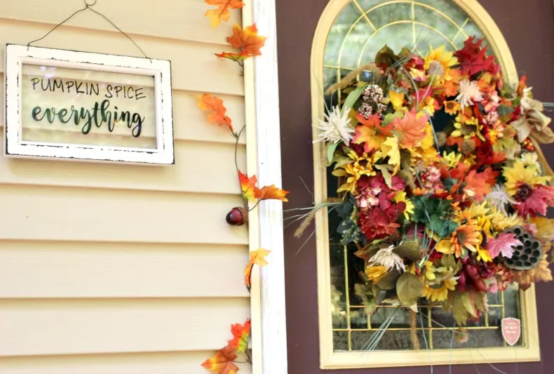 fall wreath and pumpkin spice sign