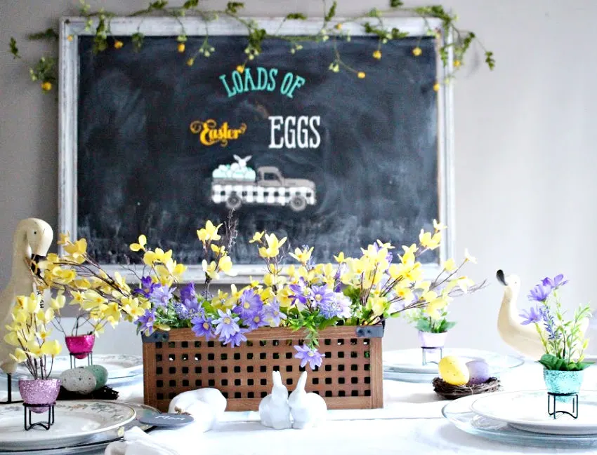 easter table with large chalkboard