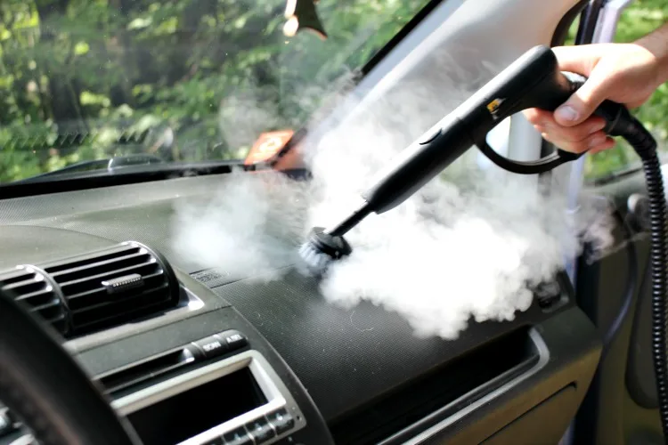 cleaning the dashboard with the homeright auto steam cleaner