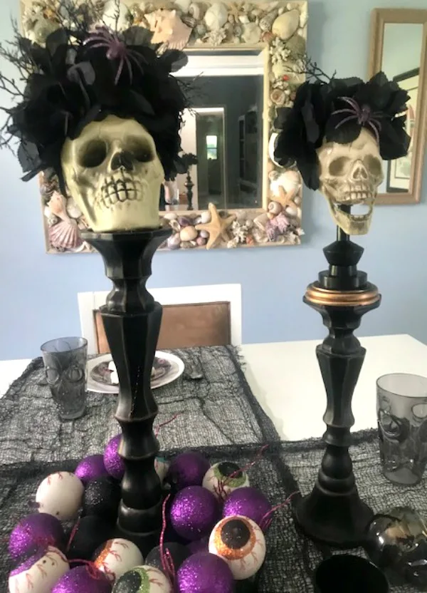 halloween table with skull candle holders