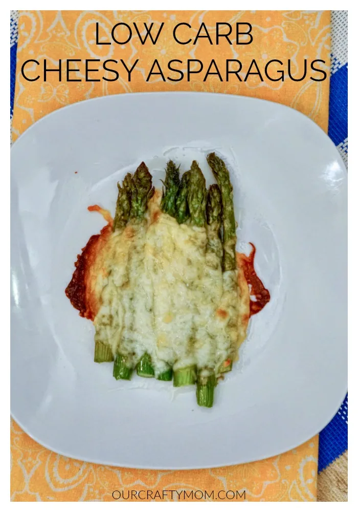 Cheesy asparagus on plate
