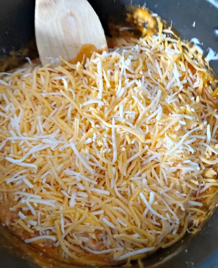 shredded cheese in pan