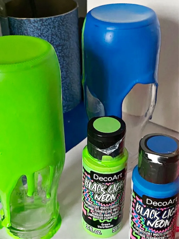 Starbucks bottles painted green and blue