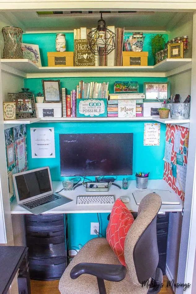 https://ourcraftymom.com/wp-content/uploads/2020/04/home-office-in-closet-with-teal-wall-1-2.jpg.webp