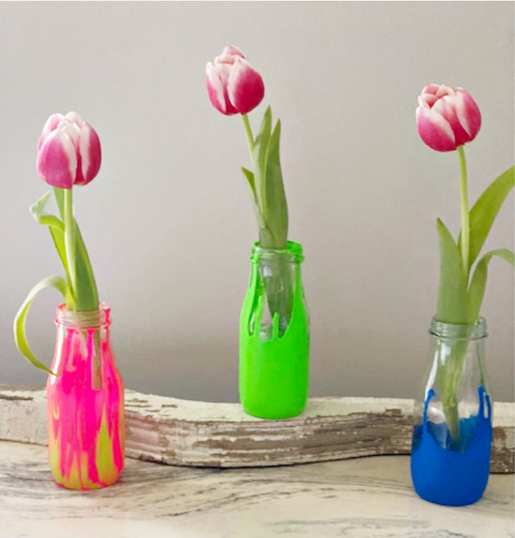 starbucks bottles used as vases with tulips