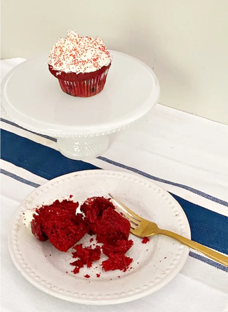 red velvet cupcake on plate with fork