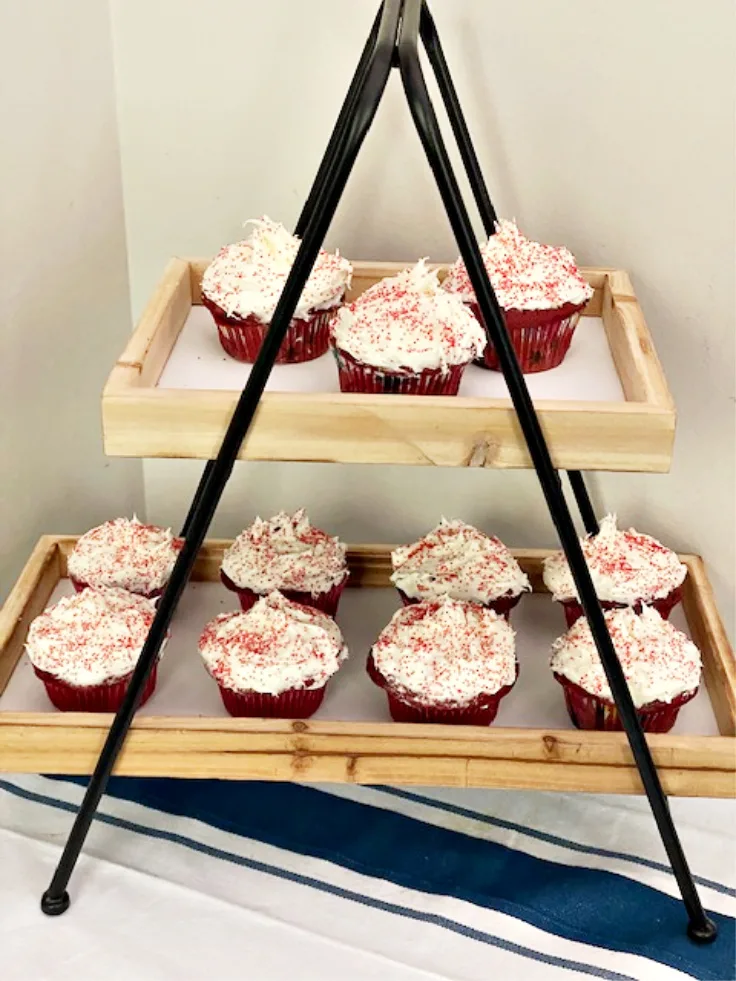 red velvet cupcakes on decocrated stand