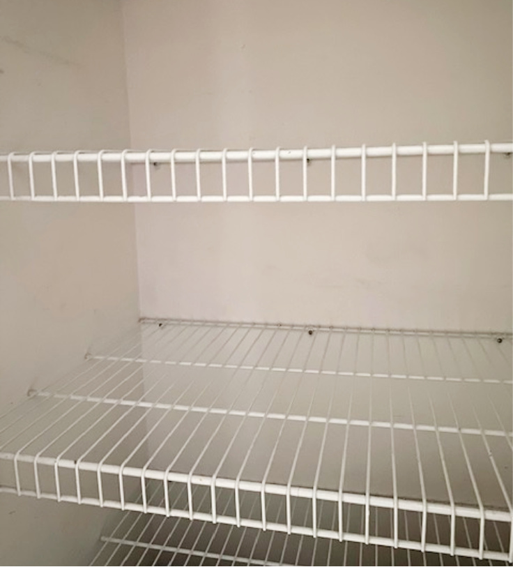 wire shelves in linen closet