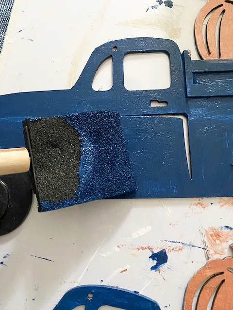 Painting truck with blue paint