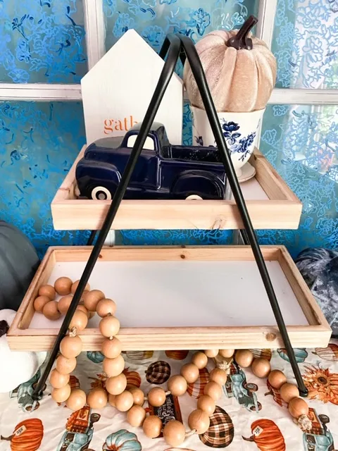 fall tiered tray with blue truck and wood beads