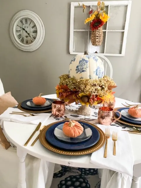 side view of blue and orange fall tablescape