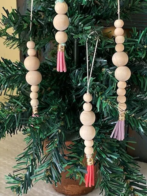 wooden bead ornaments on tree