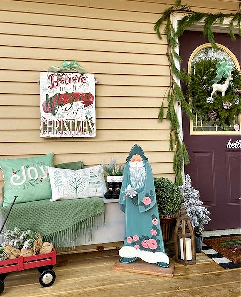 christmas front porch with fresh pine garland