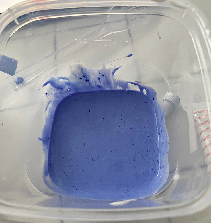 blue colored mod podge in bowl