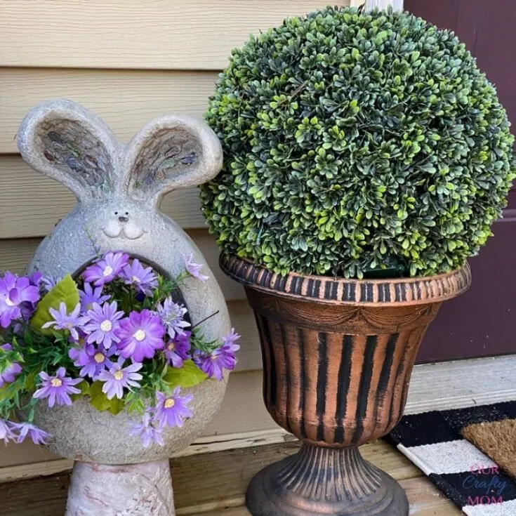 bunny planter and topiary on front porch