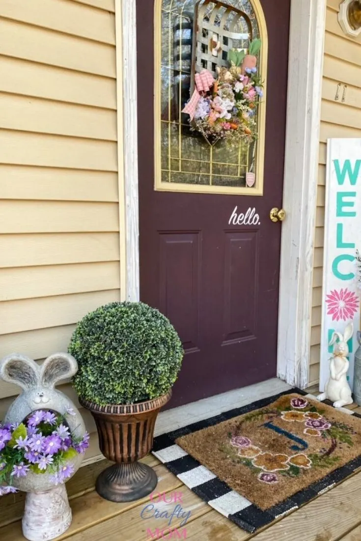 spring front porch with welcome sign