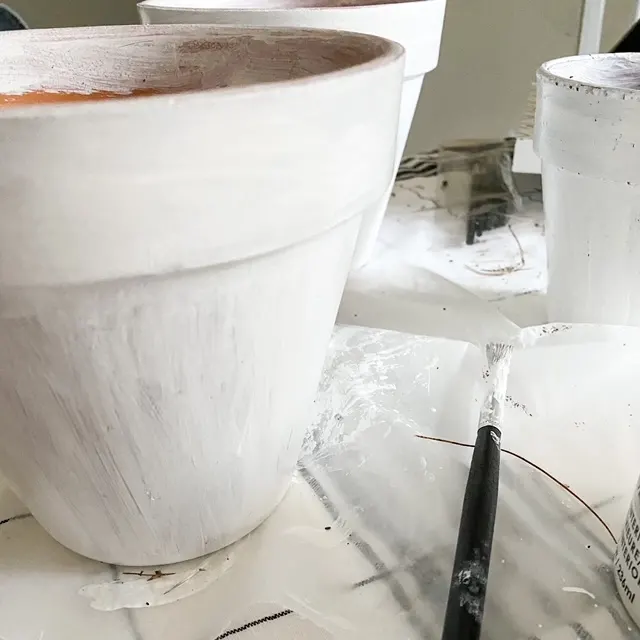white painted garden pot