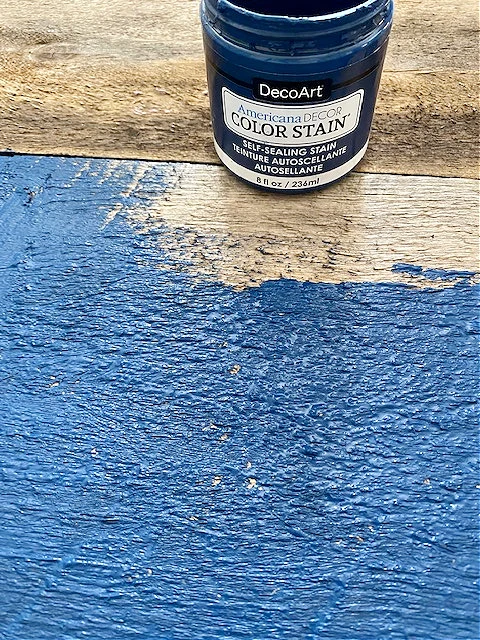 pallet wood painted with blue color stain