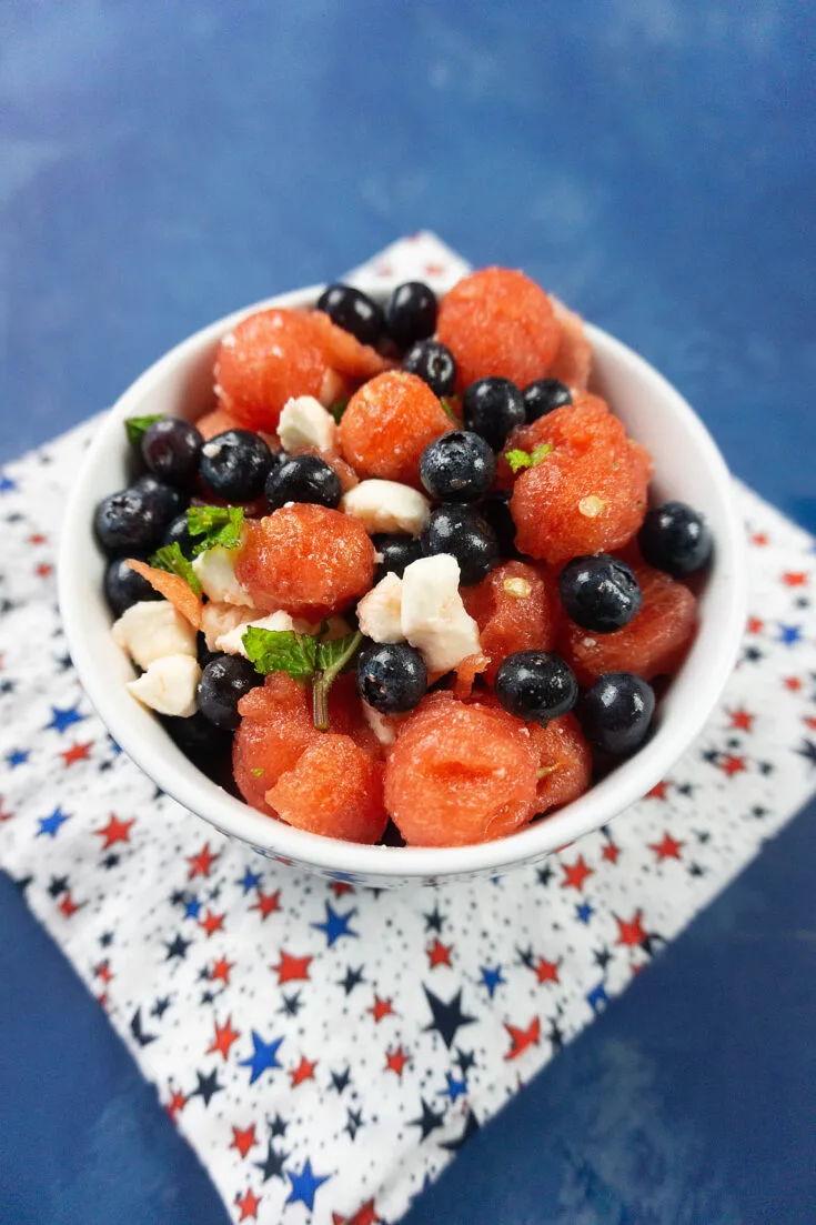 top view of red white and blue fruit salad