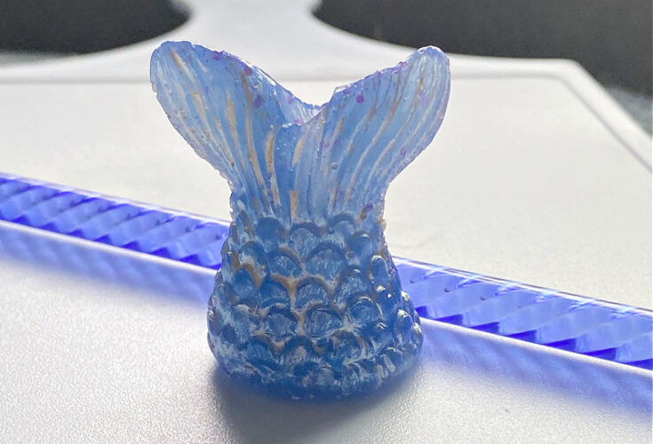 close up of mermaid resin straw topper