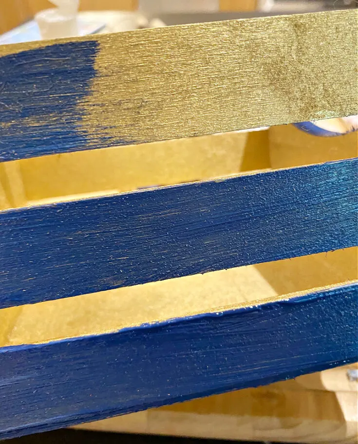 painting crate with navy paint