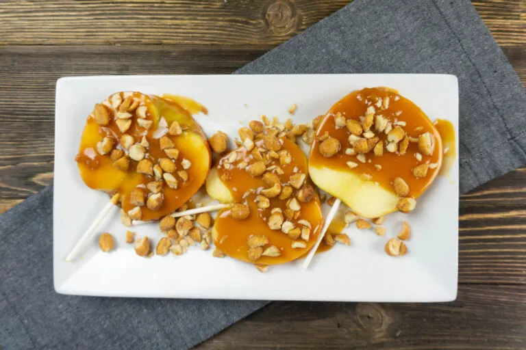 sliced caramel apples on plate