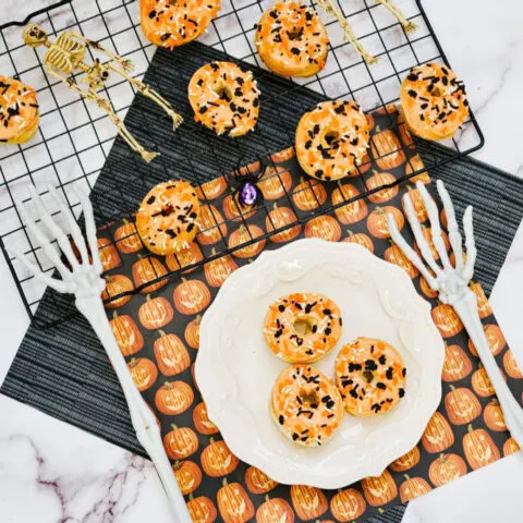 white plate with Halloween donuts