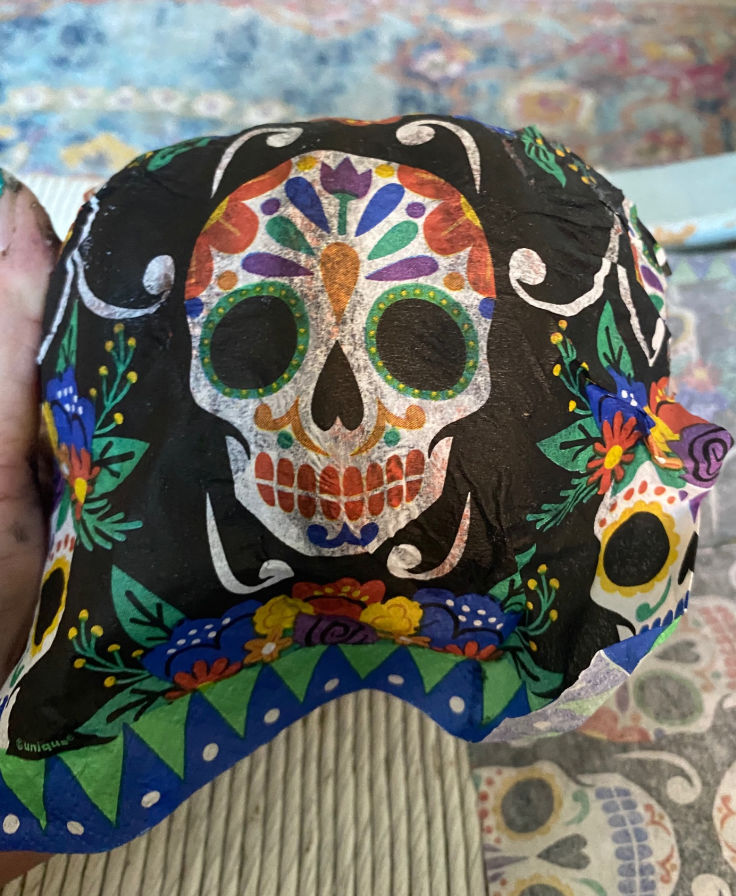 day of the dead napkin on pumpkin