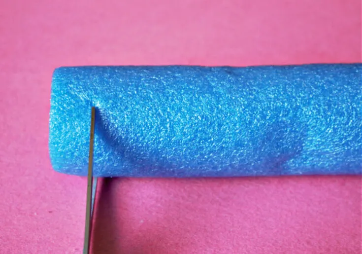 cutting pool noodle with craft knife