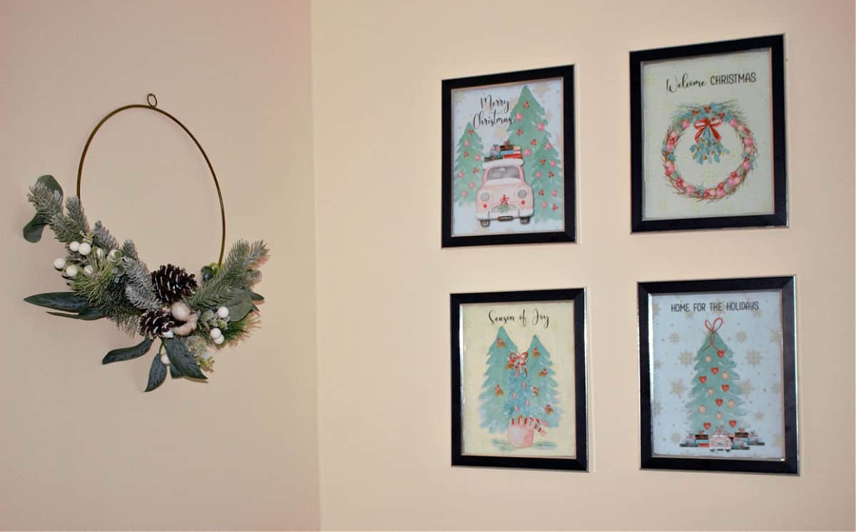 set of 4 watercolor Christmas printables on wall
