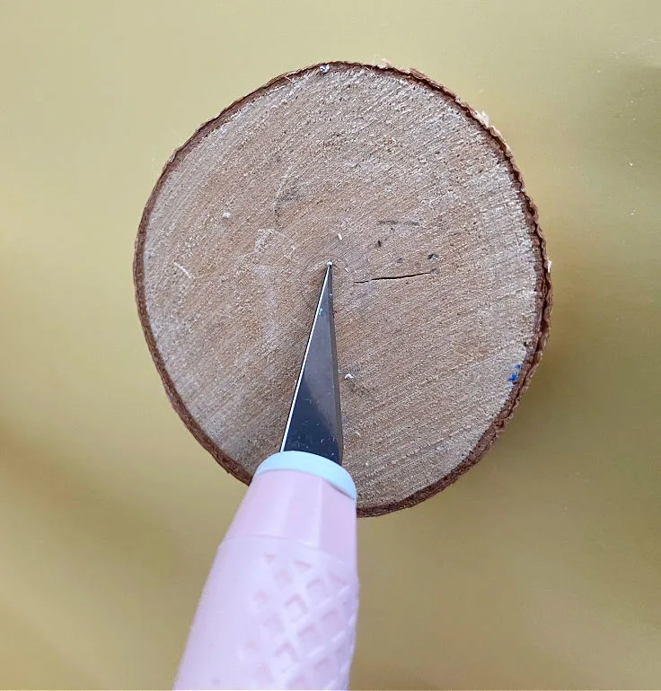 cut hole in wood base