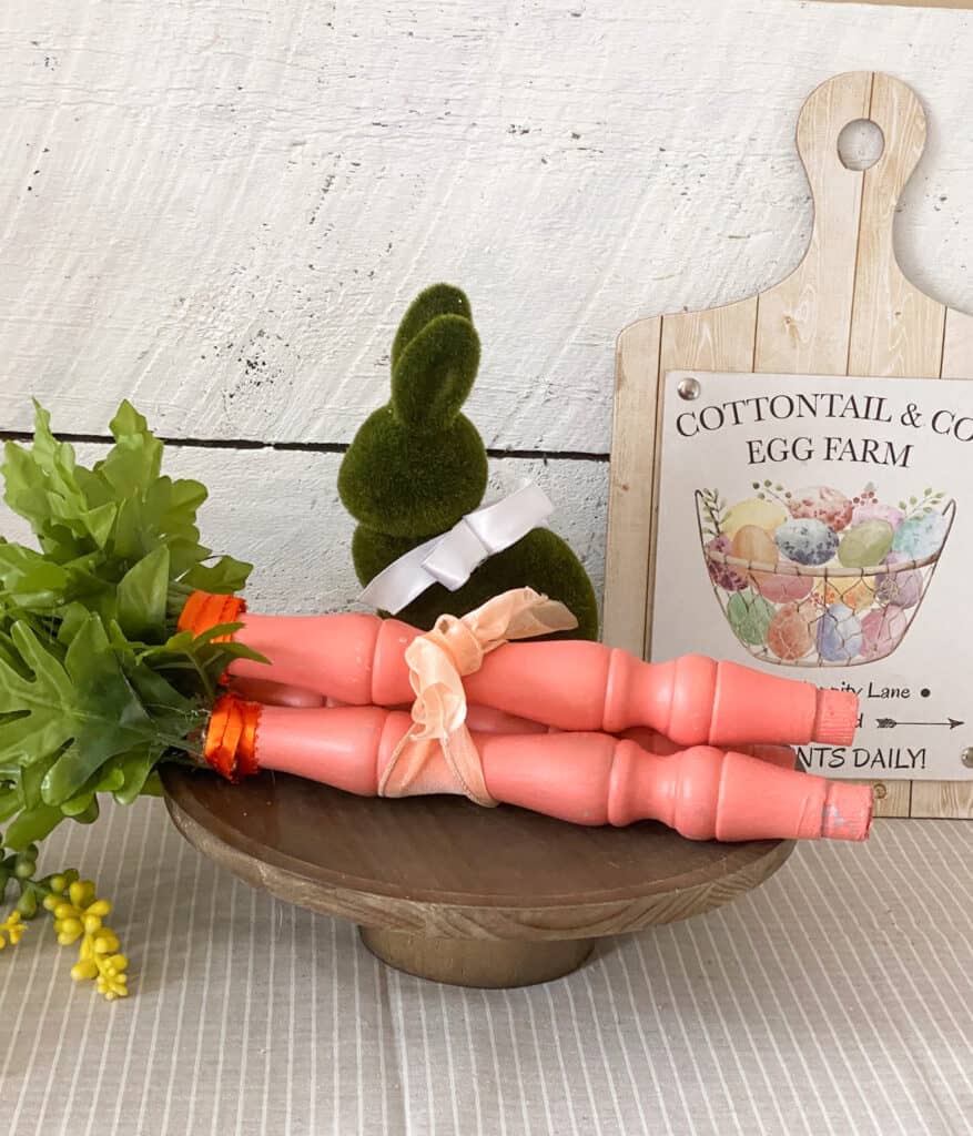 Wooden carrots on tray