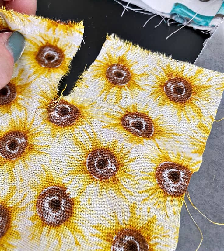 cutting sunflower fabric