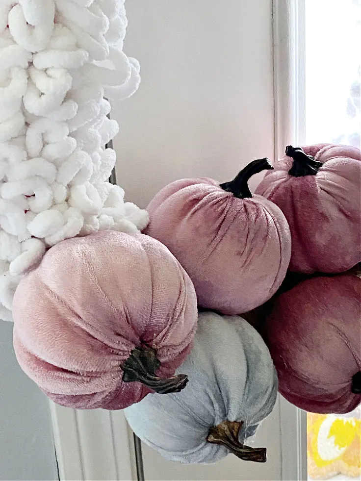 velvet pumpkins attached to loop yarn wreath