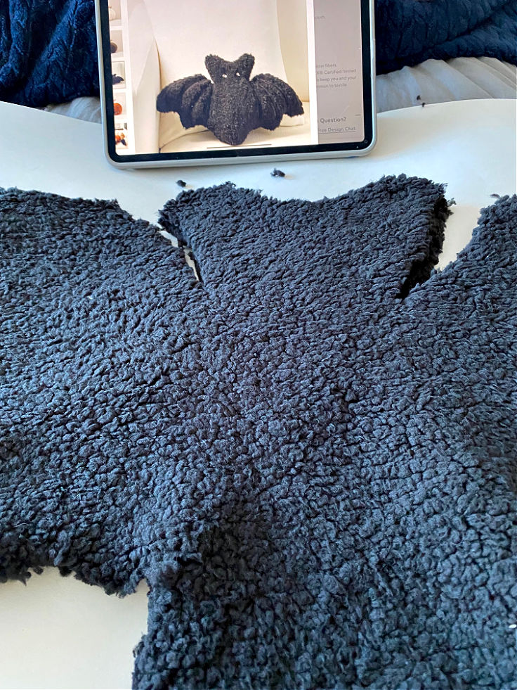 glue the bat wings pillow together with hot glue