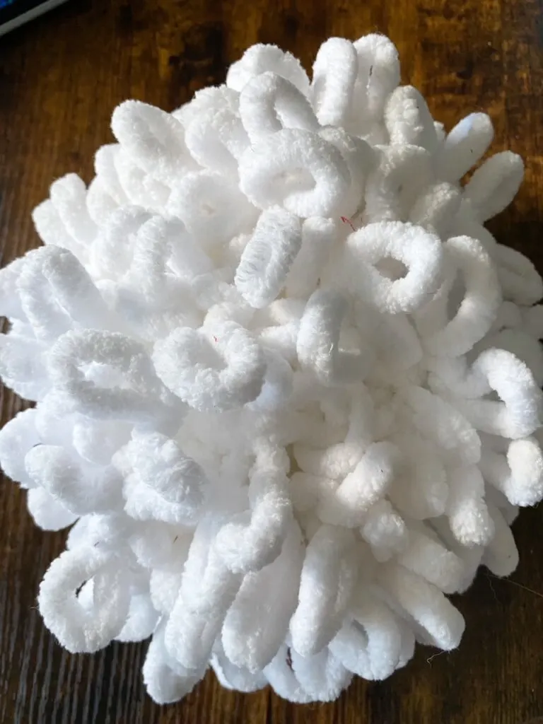 pile of white loop yarn for wreath