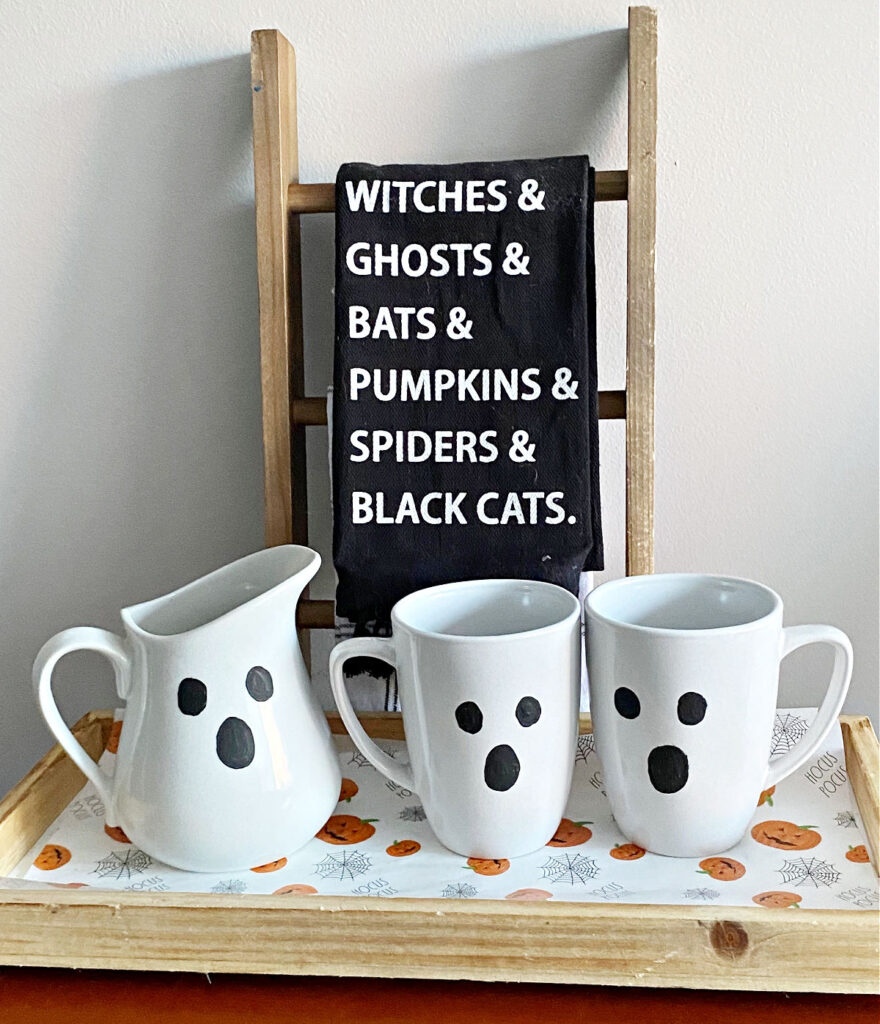 ghost mugs on serving tray for Halloween
