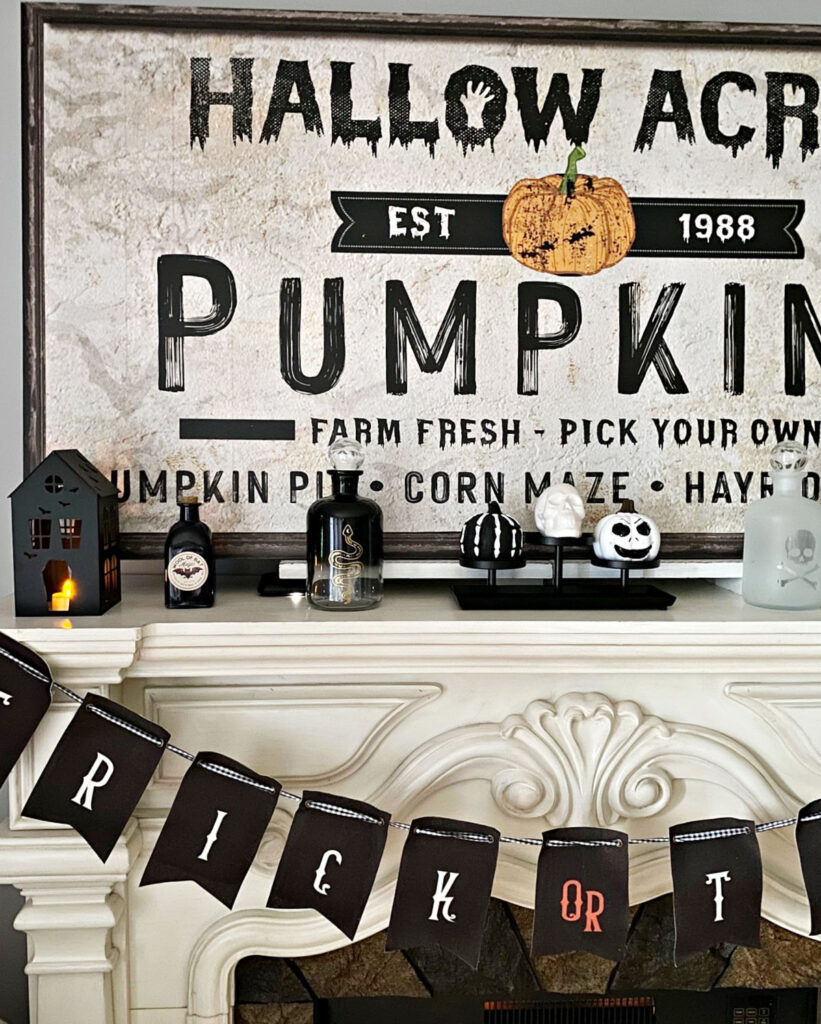 close up of Halloween mantel with black and white decor