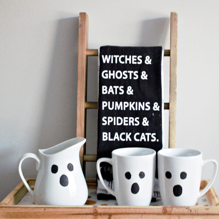 Halloween ghost mugs on tiered tray