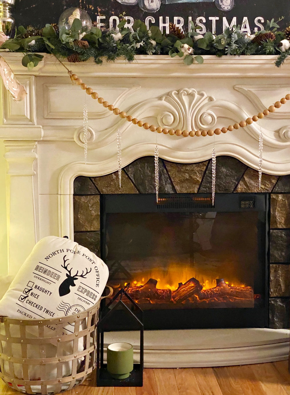 Christmas pillows by mantel hearth